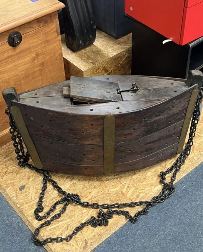 Can you solve the mystery of this unusual antique device?